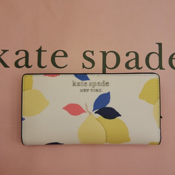 kate spade Handbags - KS Cameron Lemon Zest Large Slim Bifold Wallet